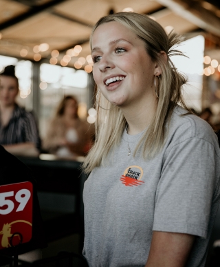 Image of woman as a server at Crack Shack